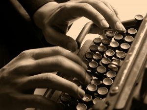 966154_old_typewriter_and_typist