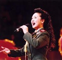 China First....actually this is China's First Lady, Peng Liyuan, who really has nothing to do with this coal mine!
